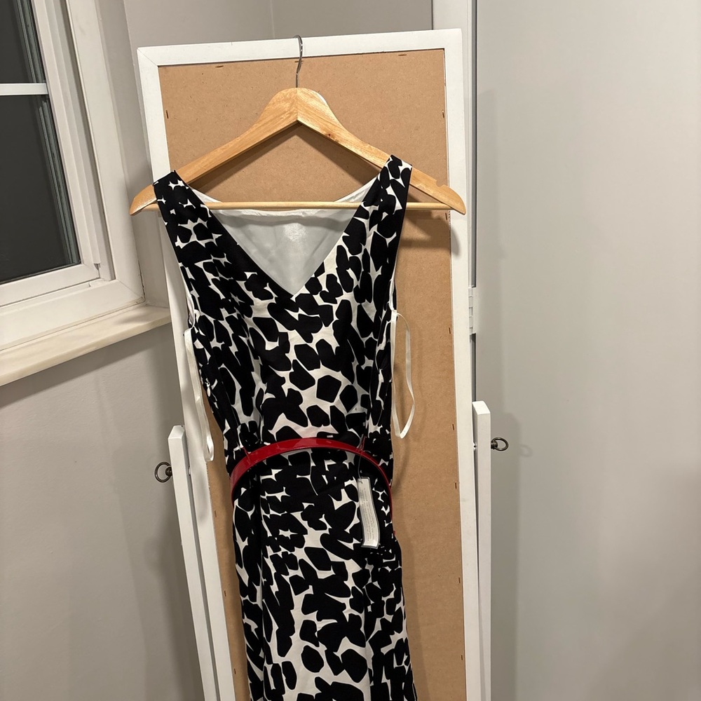 Sleeveless Black and White Printed Sheath Dress with Red Belt